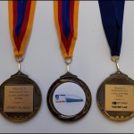 1st place and fastest lap medals