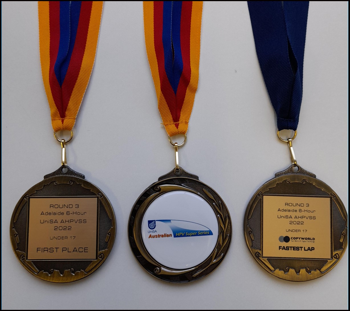 1st place and fastest lap medals